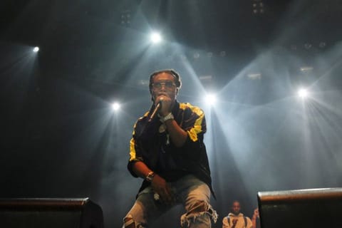 Takeoff, from the hip-hop trio Migos.