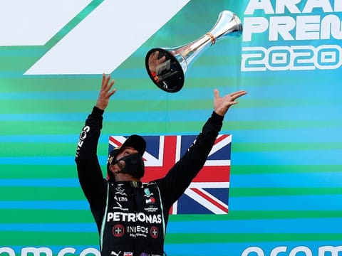 Lewis Hamilton celebrates victory on the Spanish GP podium, his 156th career win, last month.