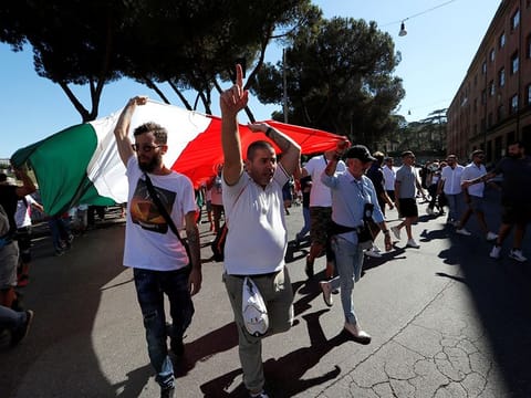 Protesters take part in a 'no mask' rally against the government's coronavirus disease (COVID-19) measures, in Rome, on September 5, 2020.