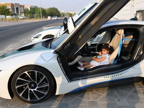 The three-year-old girl in the luxury police patrol