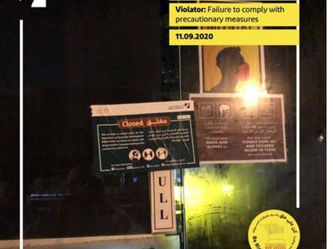 One cafe in Karama has been shut down while seven shops in different malls have been fined for violating the COVID-19 guidelines.