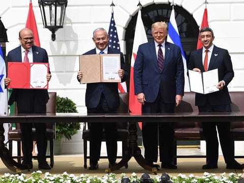 From left: Bahrain Foreign Minister Abdullatif al-Zayani, Israeli Prime Minister Benjamin Netanyahu, US President Donald Trump, and UAE Foreign Minister Abdullah bin Zayed Al-Nahyan after signing the Abraham Accords at the White House in Washington, DC, September 15, 2020.