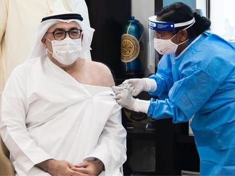 UAE's Minister of Health AbdulRahman Bin Mohammed Al Owais receiving the vaccine