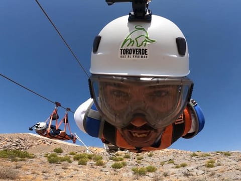 Shakir Subhan travels down a zip line in Ras Al Khaimah.