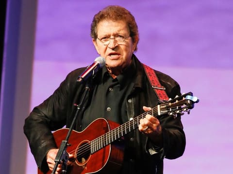 Musician Mac Davis performs at the Texas Film Awards in Austin, Texas on March 6, 2014. Davis, a country star and Elvis songwriter, died on Tuesday, Sept. 29, 2020 after heart surgery.
