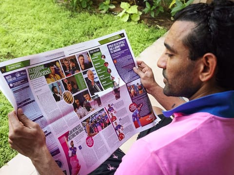Robin Uthappa catches up on IPL through the pages of Gulf News at the team hotel in Dubai back in the day