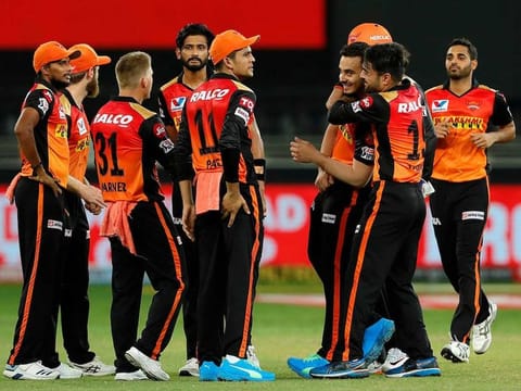 Sunrisers Hyderabad players celebrate the fall of a Chennai Super Kings' wicket in Match 14 of IPL 2020 at the Dubai International Stadium on October 3, 2020.