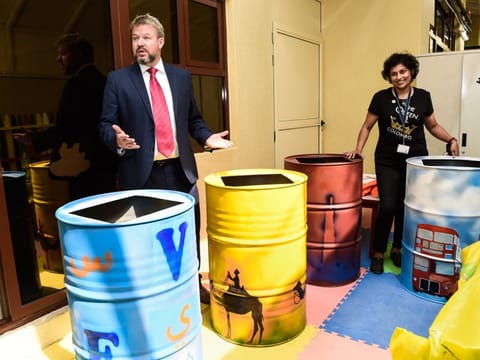 Keith Sykes, headteacher of Victoria English School in Sharjah with artist and curator Yoshita Ahmed showcasing the school's innovative sinks