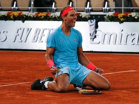 Spain's Rafael Nadal celebrates winning the final match of the French Open tennis tournament against Serbia's Novak Djokovic in three sets, 6-0, 6-2, 7-5, at the Roland Garros stadium in Paris, France, Sunday, Oct. 11, 2020