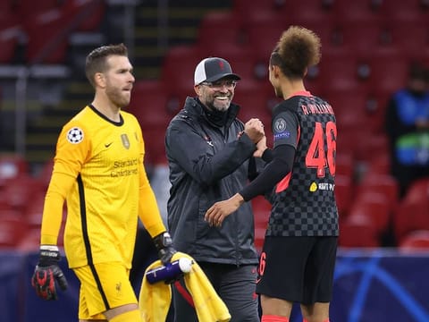 Liverpool coach Jurgen Klopp with defender Rhys Williams.