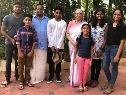 KKV Dharan, 77, a UAE resident for 57 years, with his family.