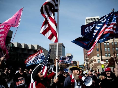 Supporters of President Donald Trump protest in Detroit against alleged vote manipulation