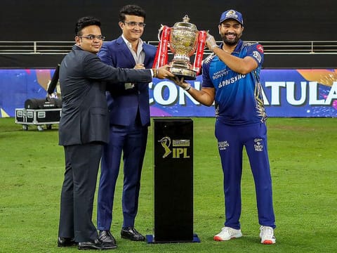 BCCI President Sourav Ganguly and BCCI Secretary Jay Shah present the Indian Premier League (IPL) 2020 winners trophy to Mumbai Indians captain Rohit Sharma, at Dubai International Cricket Stadium.