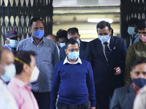 Delhi Chief Minister Arvind Kejriwal during his visit to GTB Hospital to meet COVID-19 patients, in New Delhi, Wednesday, Nov. 18, 2020. State Health Minister Satyendar Jain is also seen.