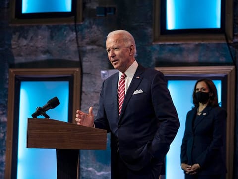 President-elect Joe Biden speaks about the economic recovery from the coronavirus pandemic as Vice President-elect Kamala Harris watches, in Wilmington, Delaware, on Monday, November 16, 2020.