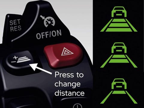 The adaptive cruise control button in a 2021 BMW R 1250 RT.