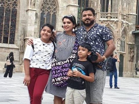 Simimol Raijo, 34, a computer teacher from India, joined in the UAE anthem-singing with her two children and husband.