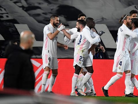 Karim Benzema celebrates scoring against Bilbao as Zinedine Zidane looks on