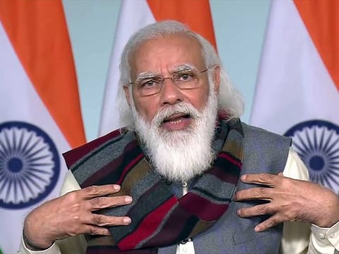 Prime Minister Narendra Modi addresses farmers at the 'Kisan Kalyan' event in Raisen (Madhya Pradesh) through video conferencing, in New Delhi on Friday, December 18, 2020.