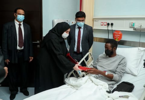 Physicians attend a cancer patient at the day care centre.