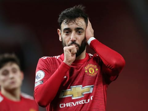 Manchester United's Bruno Fernandes celebrates scoring their third goal against Leeds.