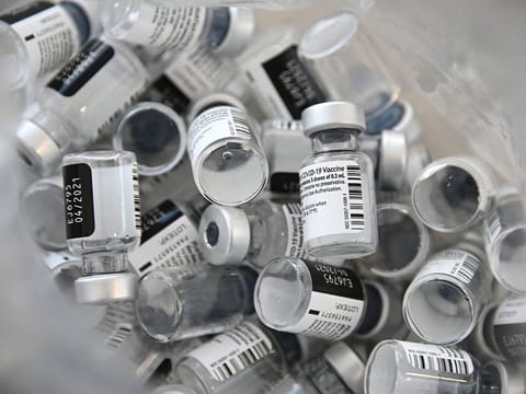 Empty bottles of Pfizer-BioNTech Covid-19 vaccine.