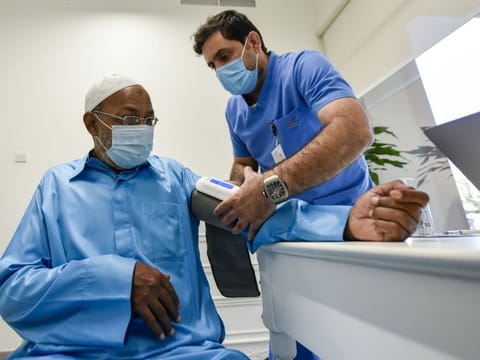Gamal Suad Ali, 61, at the Customer Happiness Center in Jumeirah for vaccination on Wednesday.