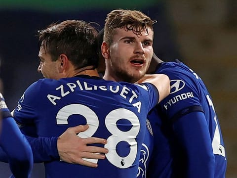 Chelsea striker Timo Werner (R) celebrates scoring his team's second against Newcastle..