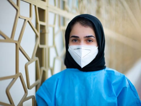 Esraa Al Agha's voluntary work has been recognised by the Frontline Heroes Office in Abu Dhabi.