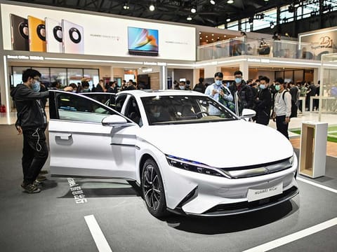 File: A BYD electric car equipped with Huawei's HiCar system in Shanghai, China. Another Chinese tech company Xiaomi is also planning to build its own car.
