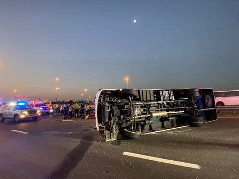 The overturned bus on Umm Suqeim Road in Dubai.