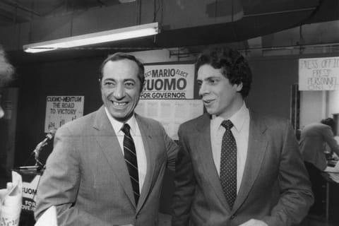 Mario Cuomo, then New York Democratic gubernatorial candidate, left, with his son and campaign manager, Andrew Cuomo, at Cuomo’s campaign offices in New York, September 24, 1982. Mario Cuomo went on to victory that autumn. Even as he tries to plot a political survival strategy in the face of sexual misconduct allegations, Gov. Andrew Cuomo is an object lesson on the dangers of kicking people on the way up.