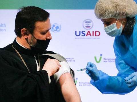 Ukrainian Orthodox Church priest Lavrenty receives a dose of the AstraZeneca COVID-19 vaccine marketed under the name CoviShield in Kyiv, Ukraine, Tuesday, March 16, 2021. Ukrainian Orthodox Church priest Lavrenty receives a dose of the AstraZeneca COVID-19 vaccine marketed under the name CoviShield in Kyiv, Ukraine, Tuesday, March 16, 2021. Researchers have said that a global vaccination programme with high efficacy vaccines is the enduring solution to fight COVID-19.