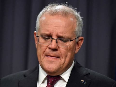 Prime Minister Scott Morrison bowed to weeks of mounting public pressure to remove two ministers from their posts.