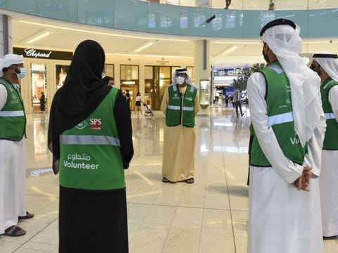 Volunteers working with Dubai Police at Dubai Mall.