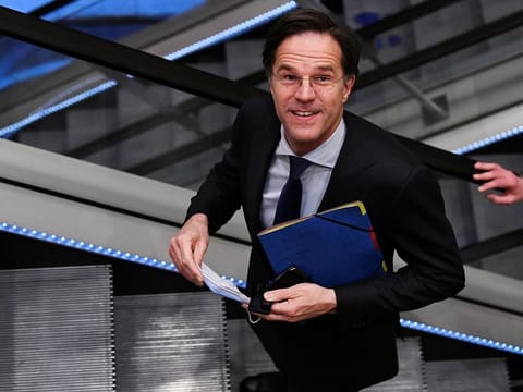 Dutch Prime Minister Mark Rutte takes an escalator after a debate over remarks he made during talks to form a new government following the March 17 national elections, in The Hague, Netherlands April 2, 2021.