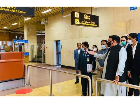 Interior Minister Sheikh Rasheed Ahmed at the terminal building of Karachi International Airport.