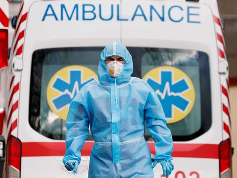 A medical worker wearing protective gear stands next to an ambulance outside a hospital for patients infected with COVID-19. File picture for illustrative purposes only.
