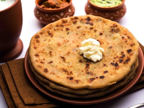 The only time you can avoid being calorie conscious is when you are devouring a Paratha (flatbreads)...