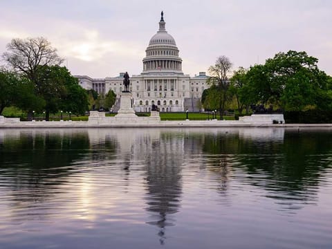 The Capitol is seen in Washington, early Wednesday, April 28, 2021, as President Joe Biden prepares to address House and Senate lawmakers on his first 100 days in office.