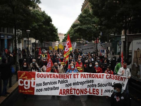 Workers of the leftist union CGT (General Work Confederation) demonstrate on May Day in Marseille, southern France, Saturday, May 1, 2021.