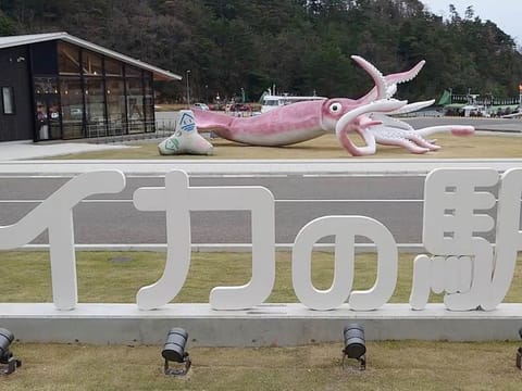 A giant squid statue built using coronavirus disease (COVID-19) subsidies is seen in Noto, Ishikawa prefecture, Japan April 13, 2021, in this still image obtained from a social media video.