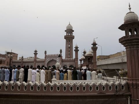 Muslims perform last Friday prayer during the holy fasting month of Ramadan, at the rooftop of a mosque, in Peshawar, Pakistan, Friday, May 7, 2021.
