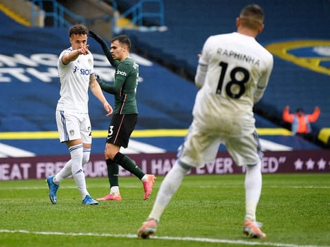 Leeds United's Rodrigo, left, and Raphinha celebrate against Tottenham