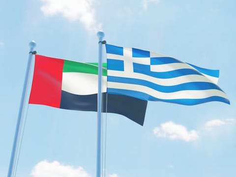 UAE and Greece national flags.