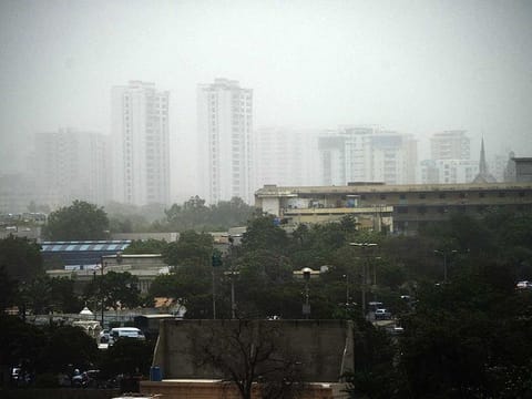 A general view shows Pakistan's port city of Karachi on May 18, 2021 during a sand storm.
