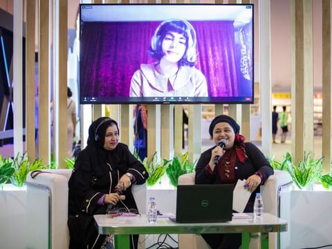Emirati author Aisha Abdulla (left) speaking at the ‘Writers and Readers’ session at the 12th edition of SCRF at Expo Centre Sharjah