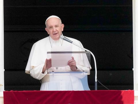 Pope Francis delivers his message during the Angelus noon prayer from the window of his studio overlooking St.Peter's Square, at the Vatican, Sunday, June 13, 2021.
