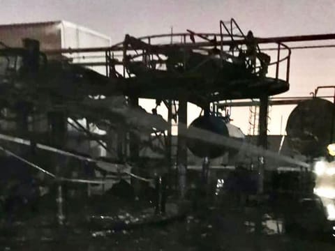 The teams prevented the fire from spreading to other tanks