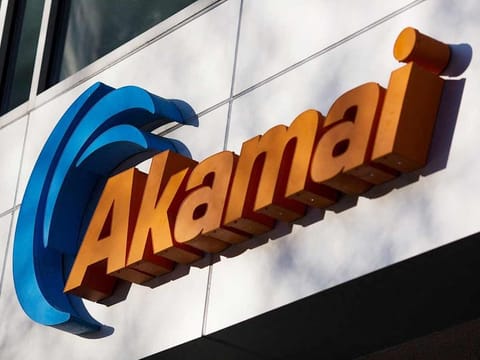 A sign for Akamai technology company on a building in Cambridge, Massachusetts.